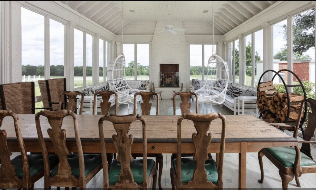 The spacious screened porch at Goodthyme Farm offers bug-free open air entertaining. (Photo by Kerry Kirk Photography)